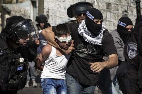 Palestinian boy detained and choked by Israeli officer
